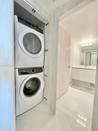 a view of a washer and dryer in a utility room