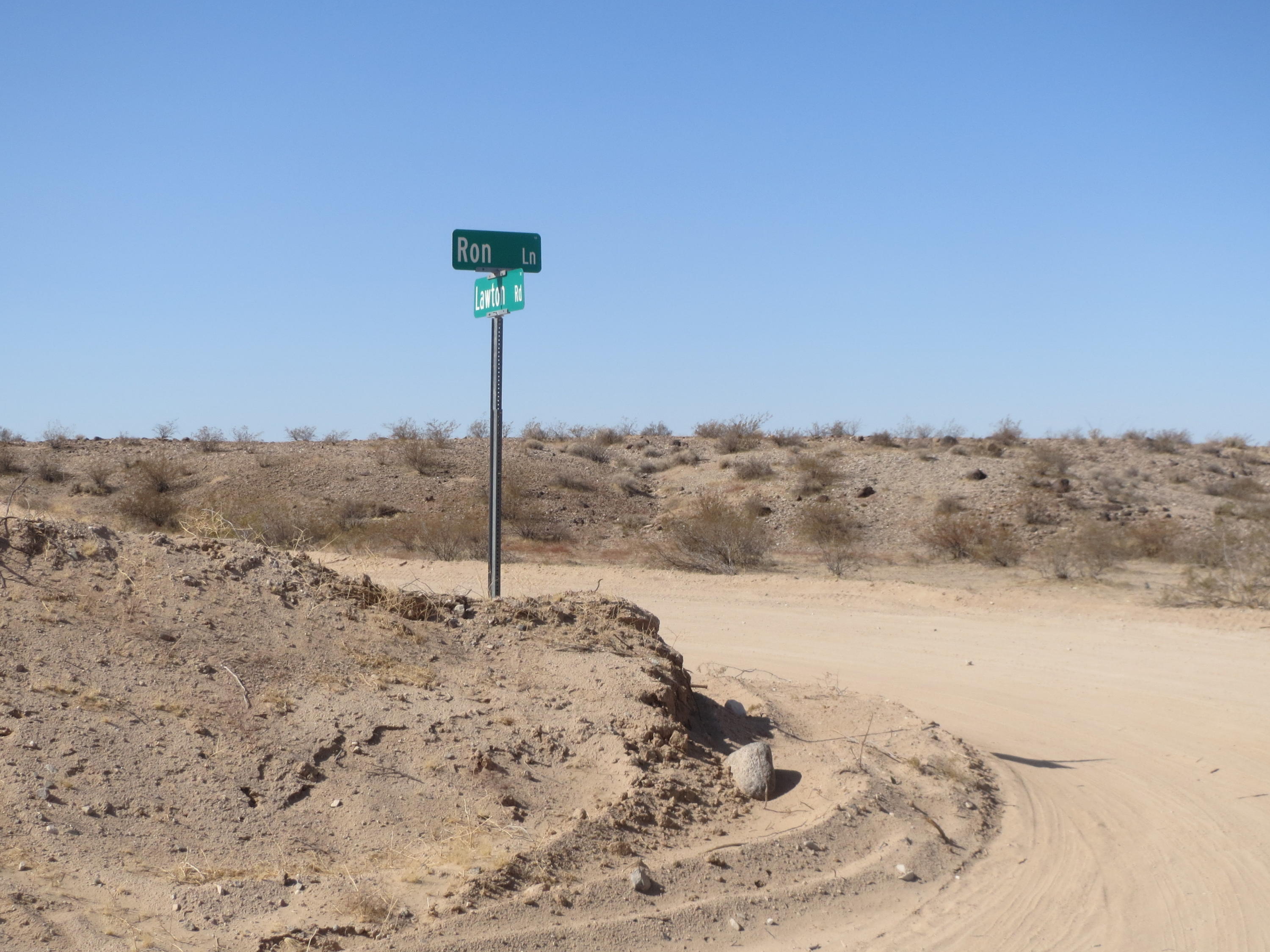 Lot 5 Lawton Road Yucca, AZ 86438 - Photo 3 of 12 View of Lot 5 looking across intersection of Ron Road and Lawton Road