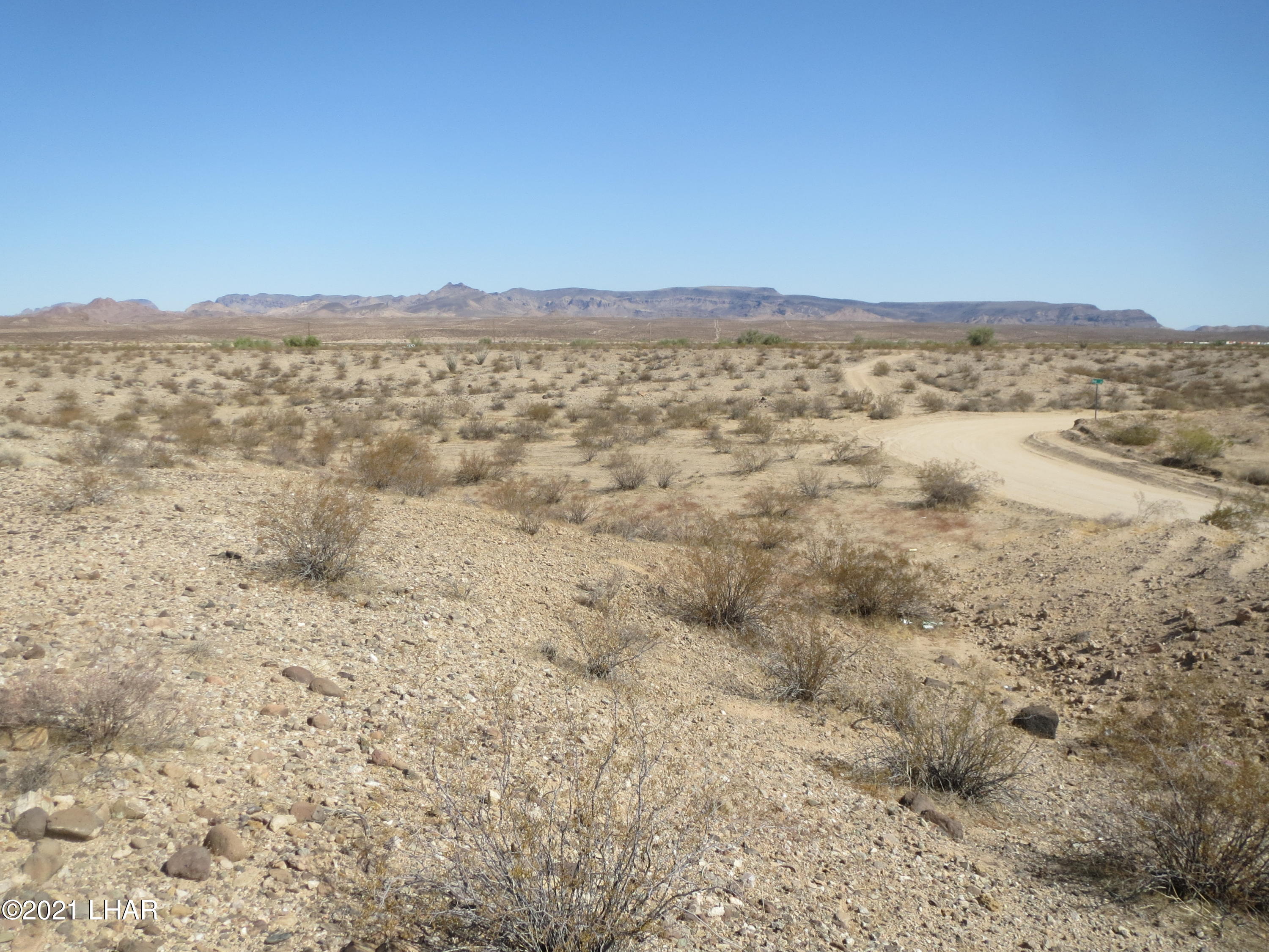 Lot 5 Lawton Road Yucca, AZ 86438 - Photo 6 of 12 View of Lot with Lawton Road on right side