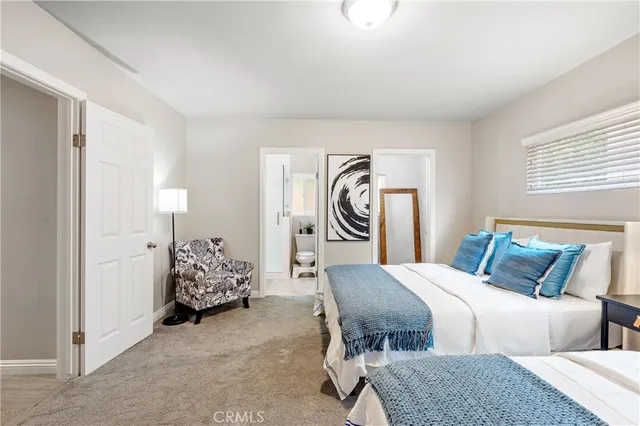 a bedroom with furniture and bed