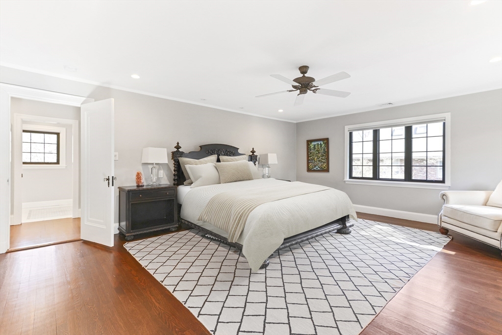 26 Greylock Road Newton, MA 02465 - Photo 16 of 28 a bedroom with a large bed and a couch