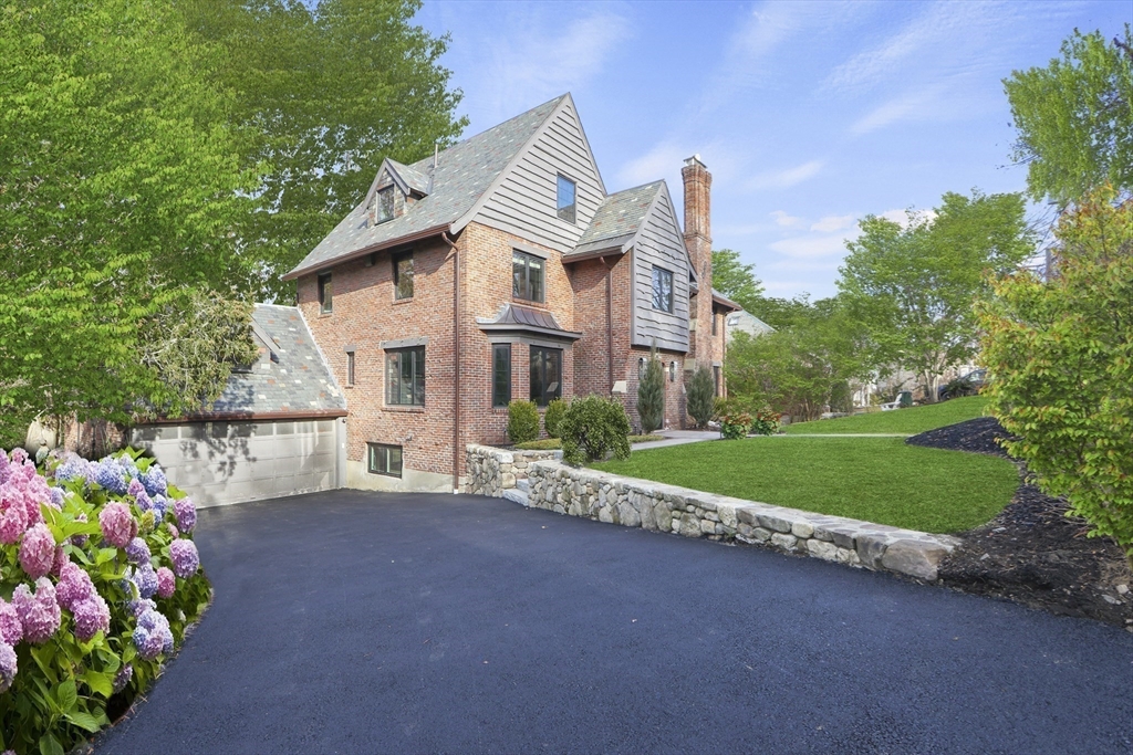 26 Greylock Road Newton, MA 02465 - Photo 27 of 28 a front view of a house with a yard