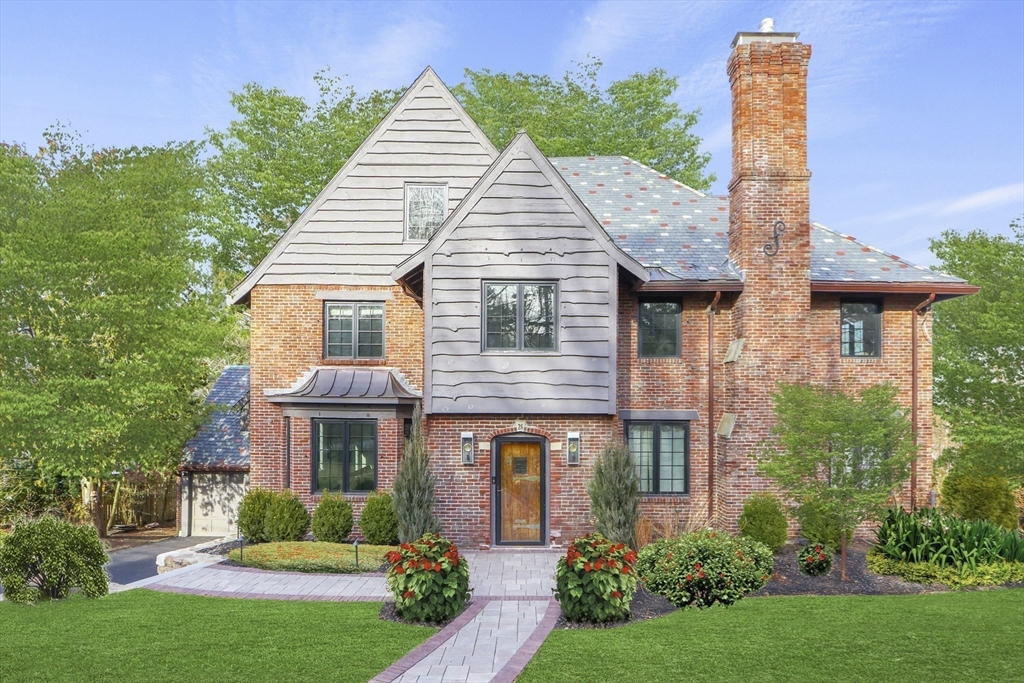 26 Greylock Road Newton, MA 02465 - Photo 28 of 28 a front view of a house with garden