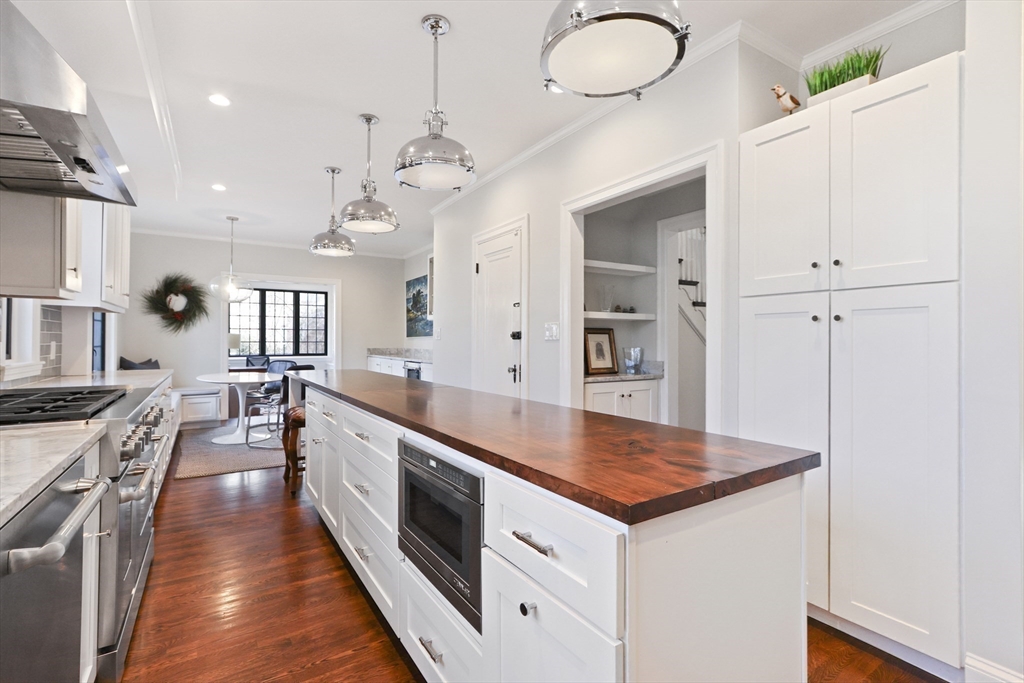 26 Greylock Road Newton, MA 02465 - Photo 7 of 28 a large white kitchen with lots of counter space