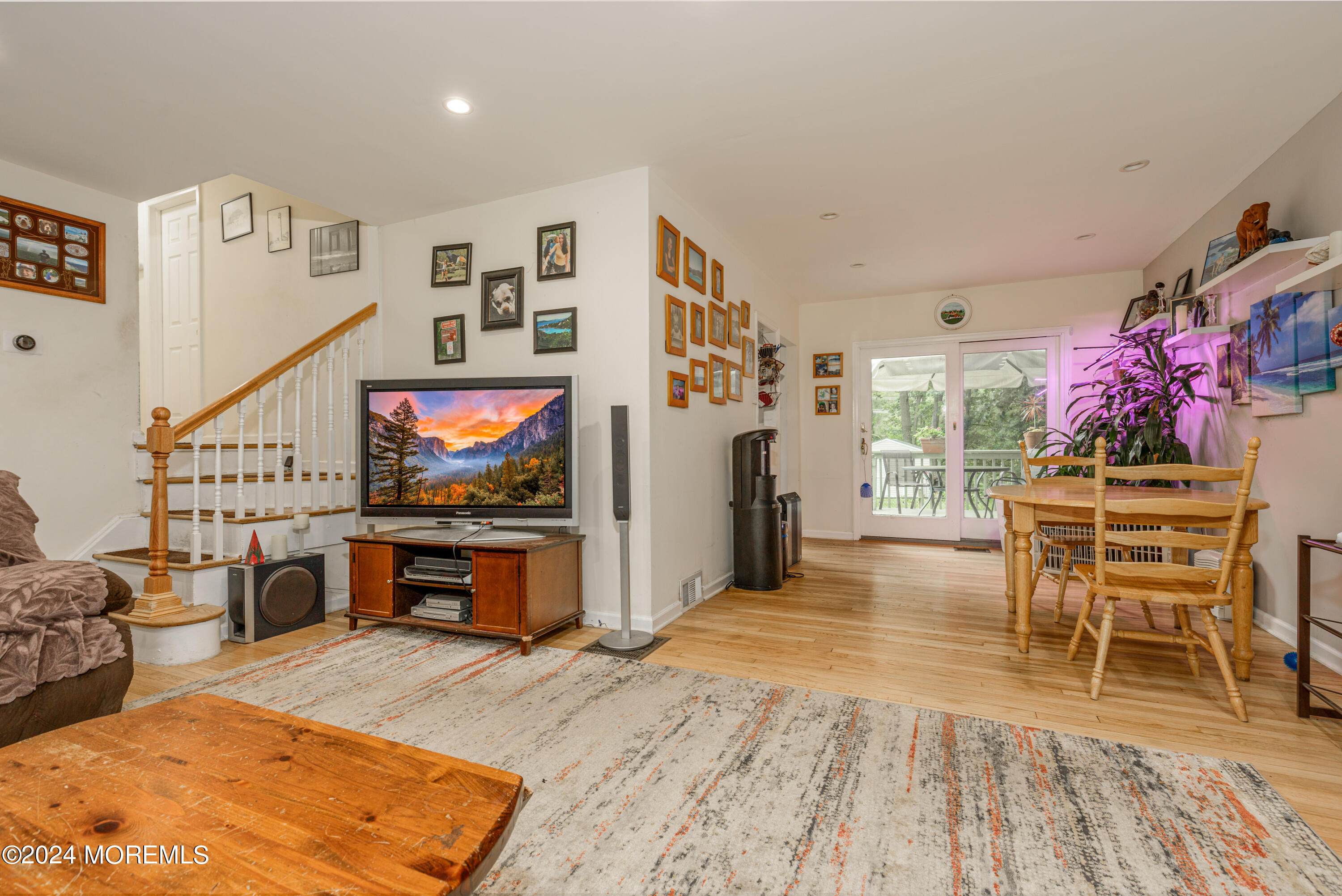 16 Boundary Road Marlboro, NJ 07746 - Photo 10 of 28 a living room with furniture and a flat screen tv