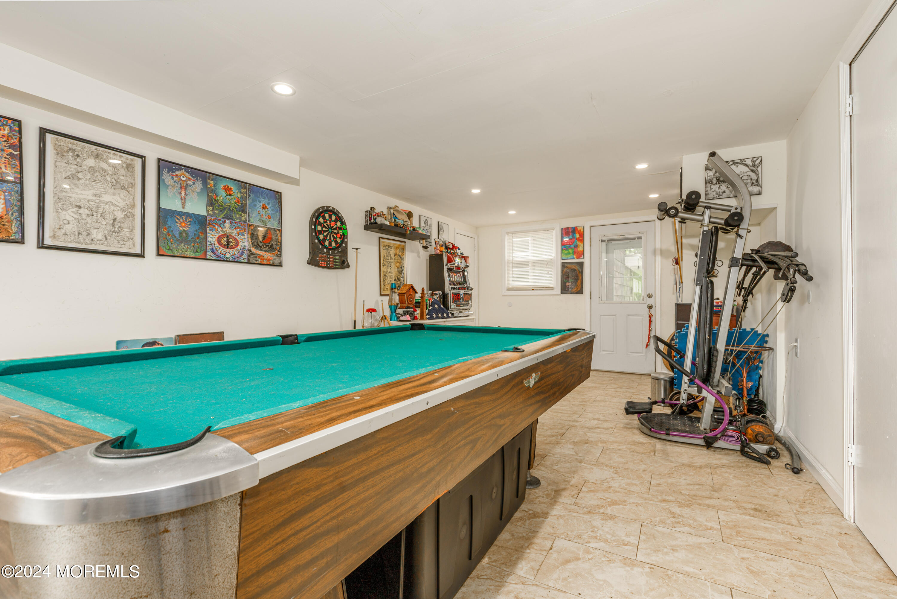 16 Boundary Road Marlboro, NJ 07746 - Photo 6 of 28 a room with gym equipment and large window