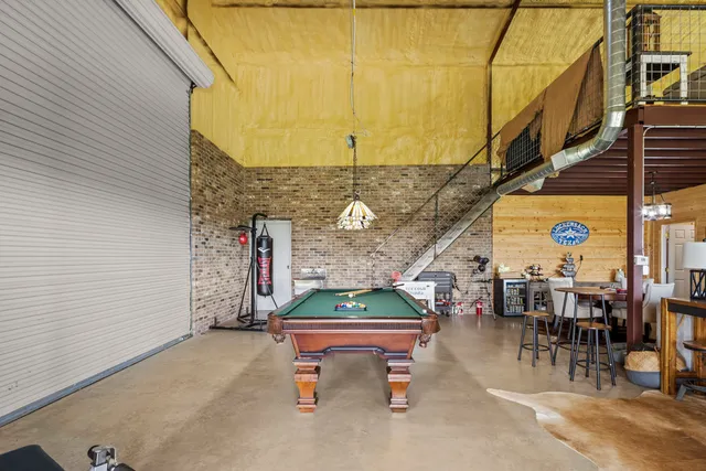 a room with furniture and a chandelier