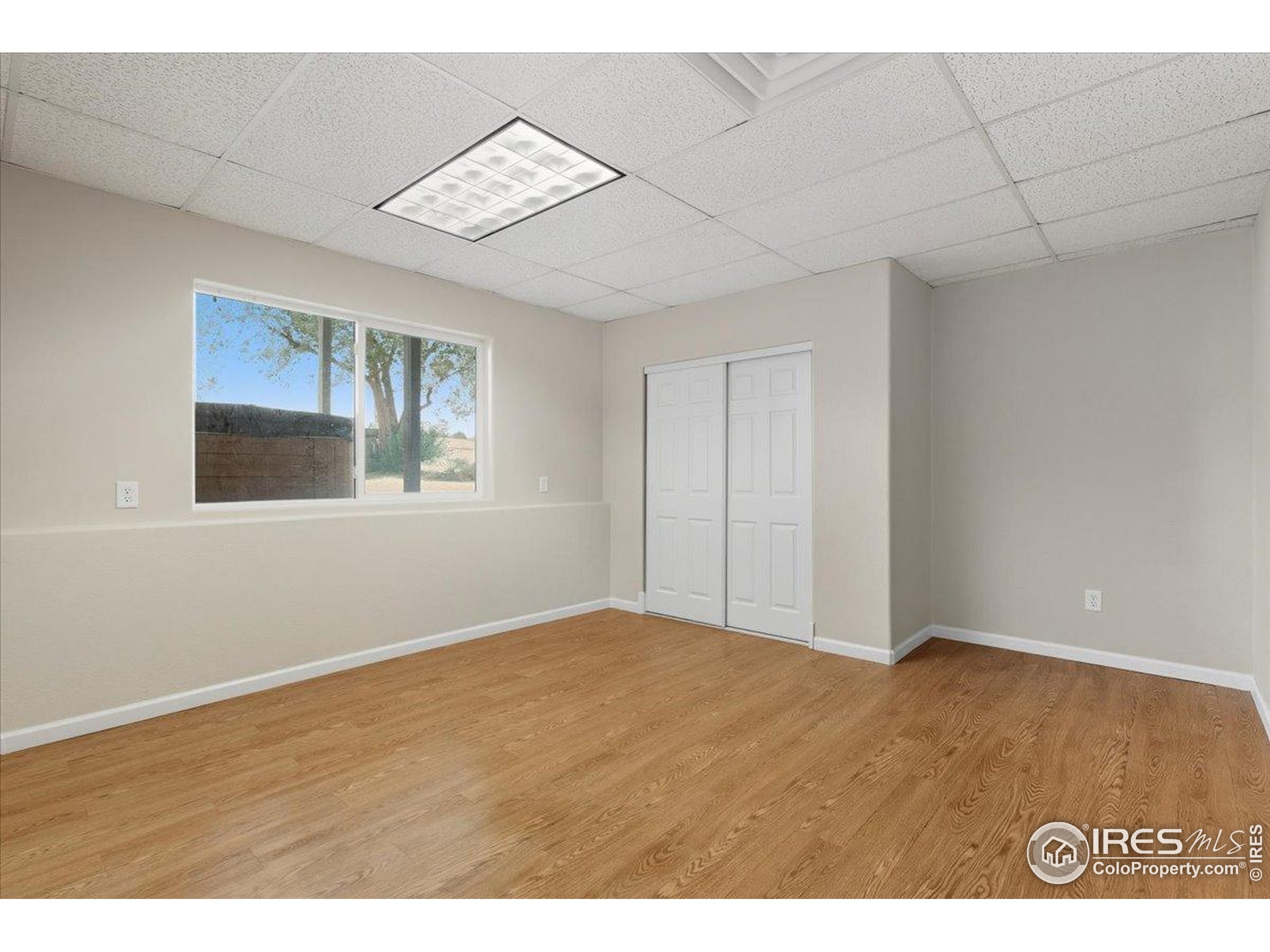 7133 North Co Road 19 Fort Collins, CO 80524 - Photo 40 of 50 a view of an empty room with a window