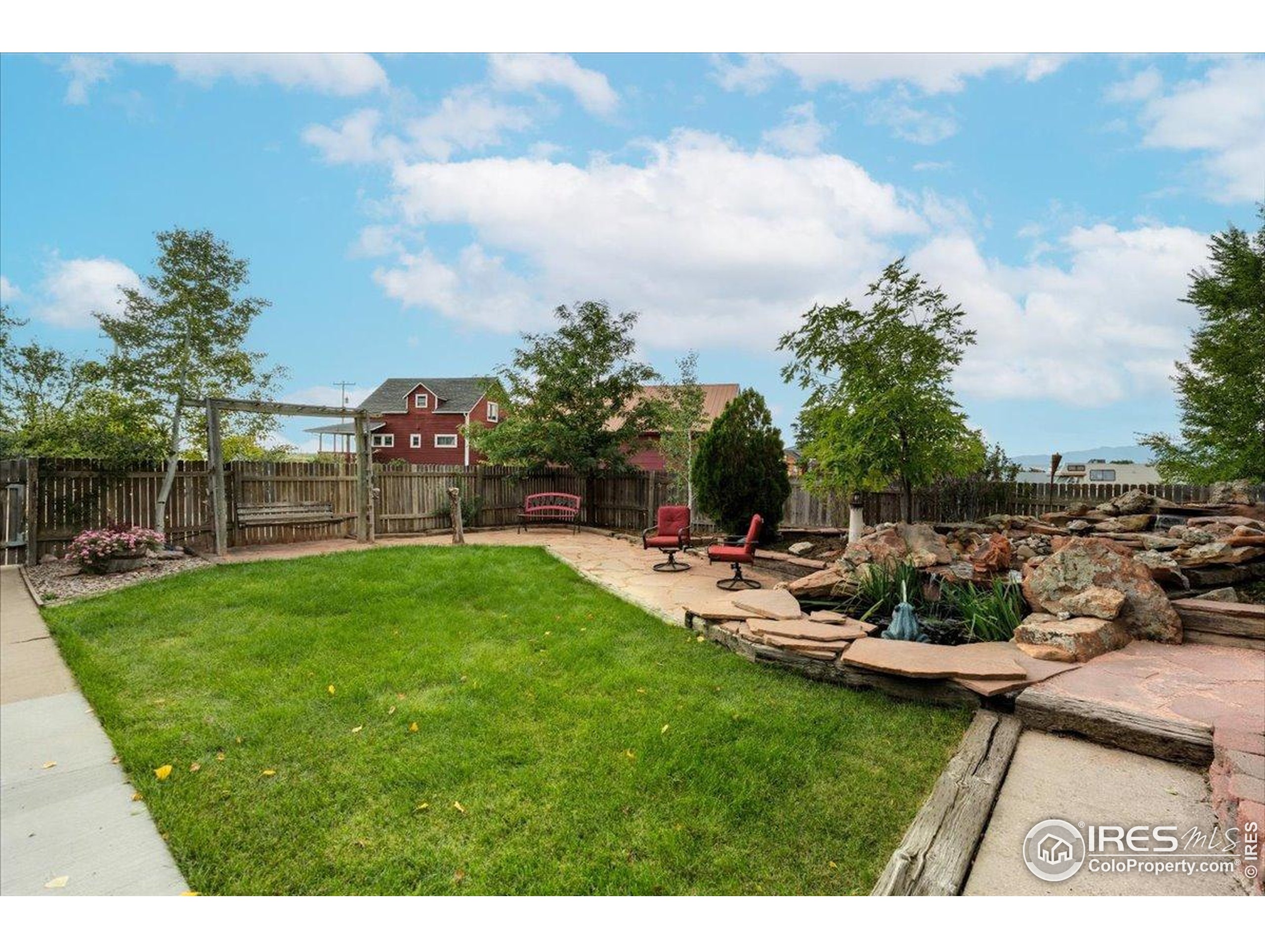 7133 North Co Road 19 Fort Collins, CO 80524 - Photo 47 of 50 a view of a backyard with sitting area