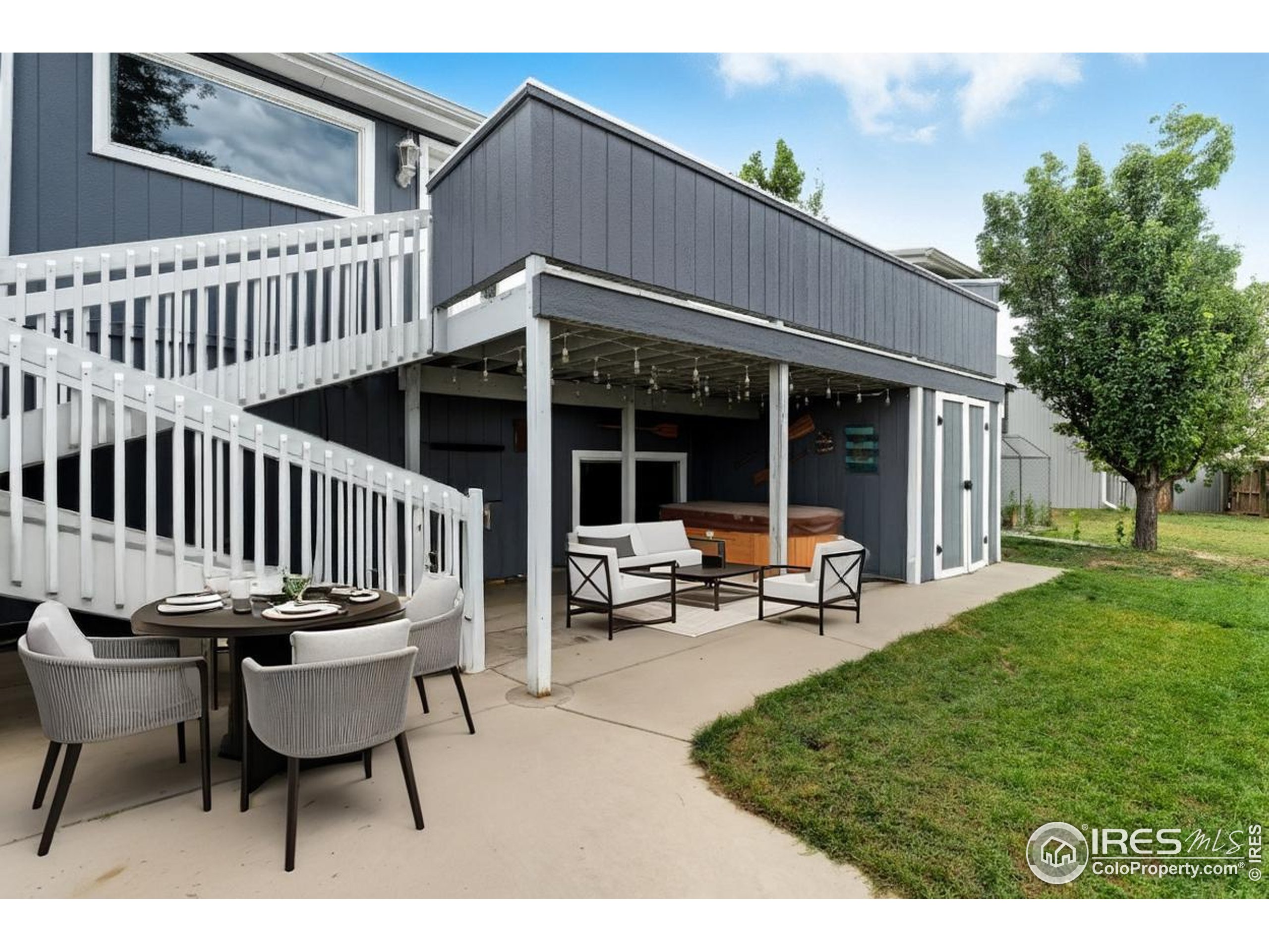 7133 North Co Road 19 Fort Collins, CO 80524 - Photo 8 of 50 a view of a patio with a table and chairs