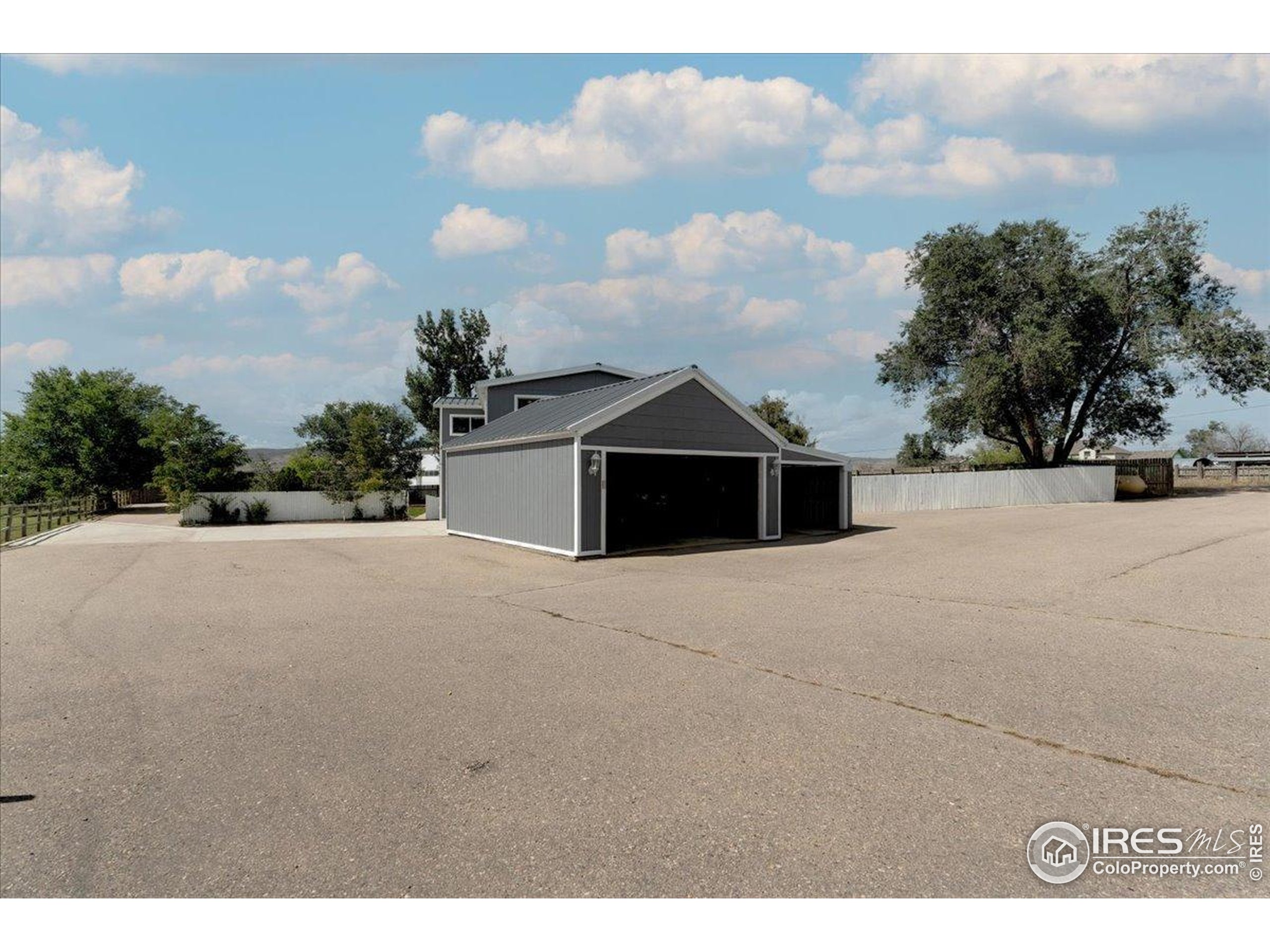 7133 North Co Road 19 Fort Collins, CO 80524 - Photo 10 of 50 a view of a house with a yard