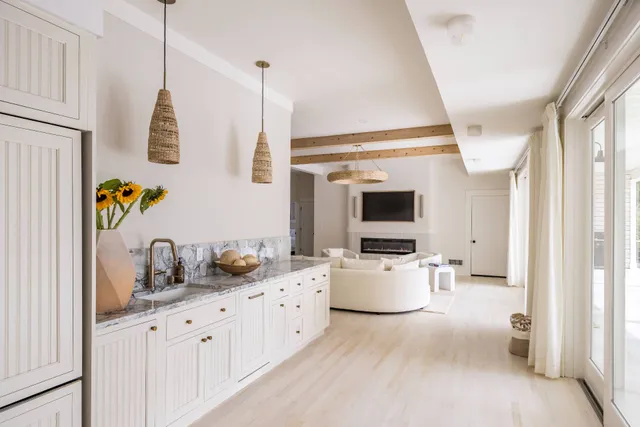 a room with a couch and a flat screen tv