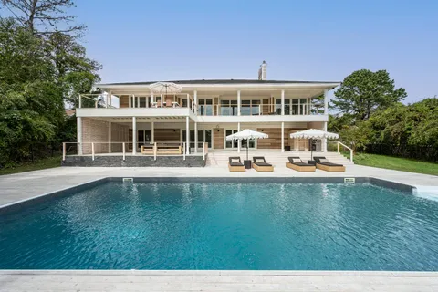 a view of a building with a swimming pool