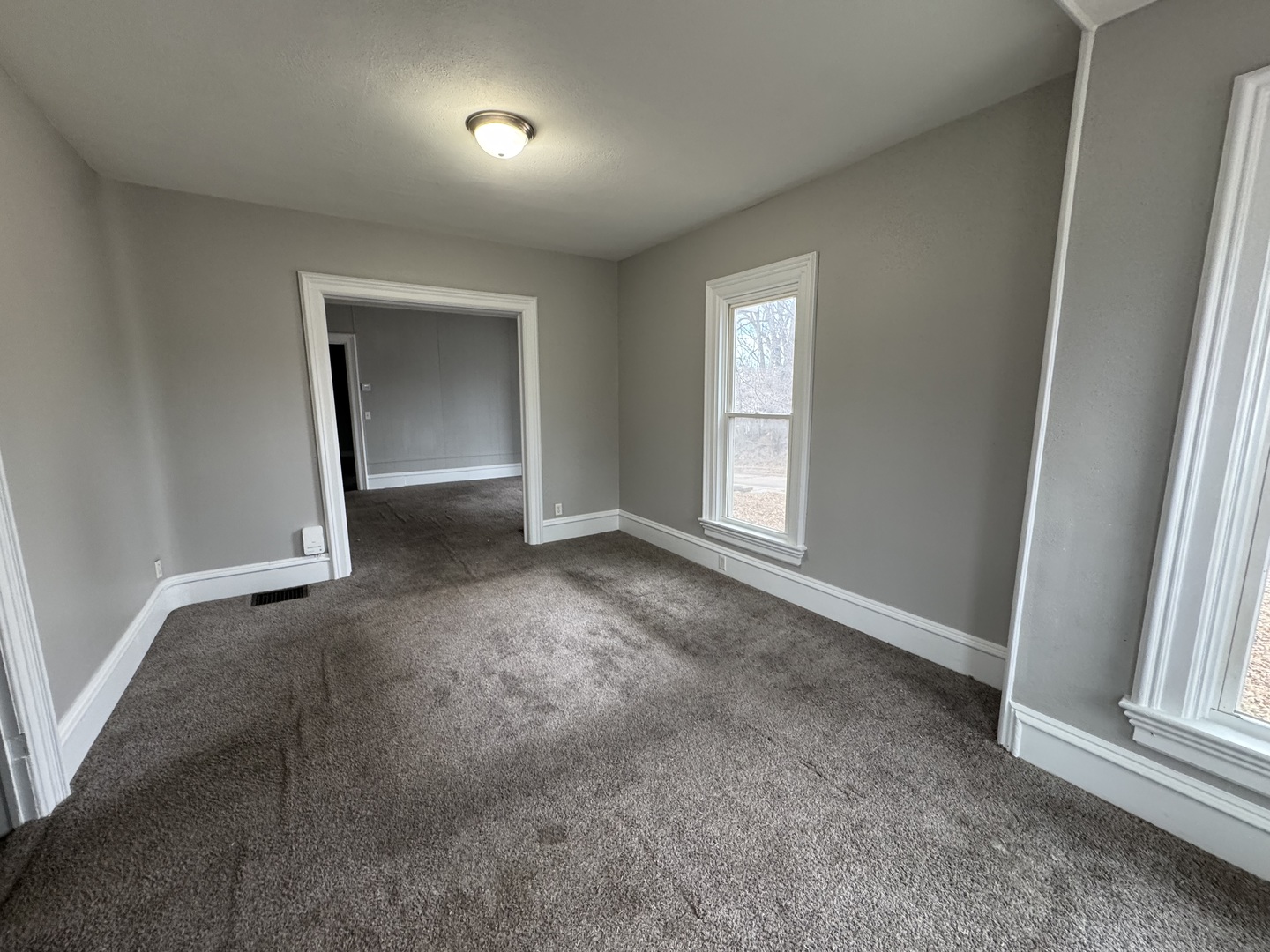 1155 12th Avenue Moline, IL 61265 - Photo 15 of 18 an empty room with windows and closet