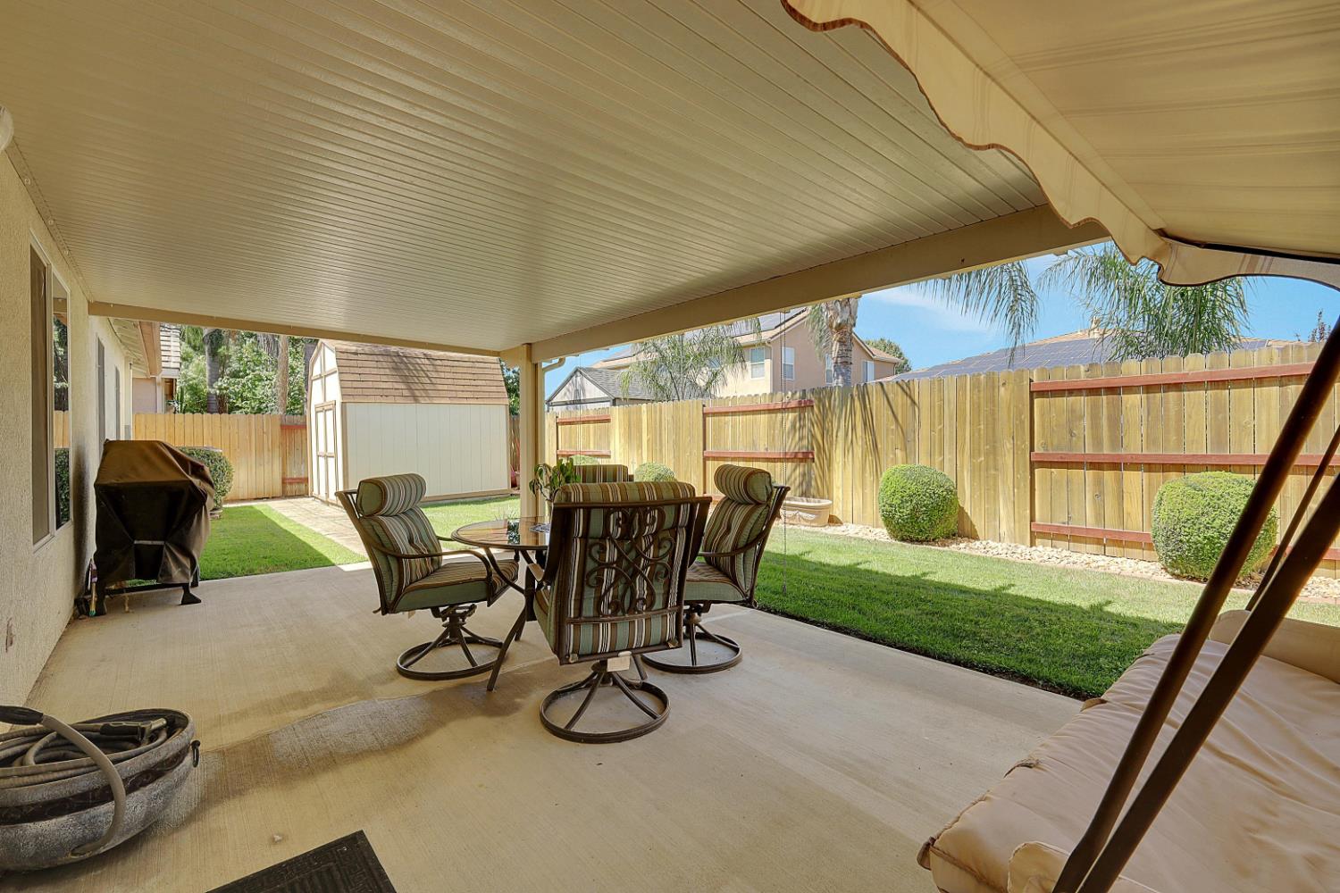 9840 Ellis Way Live Oak, CA 95953 - Photo 36 of 44 a view of a patio with chairs and table in patio