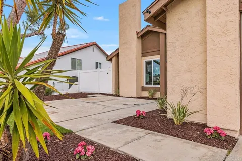 a house view with a outdoor space