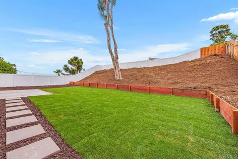 a view of yard with an ocean view