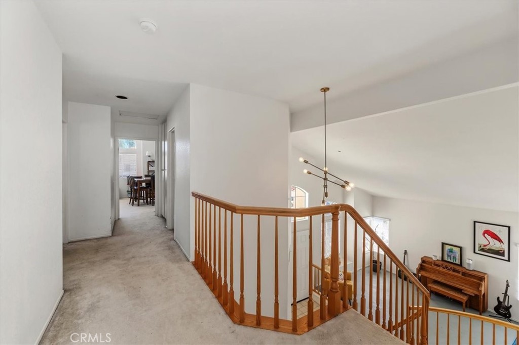 352 Leafwood Court Riverside, CA 92506 - Photo 23 of 42 a view of a hallway with closet and stairs