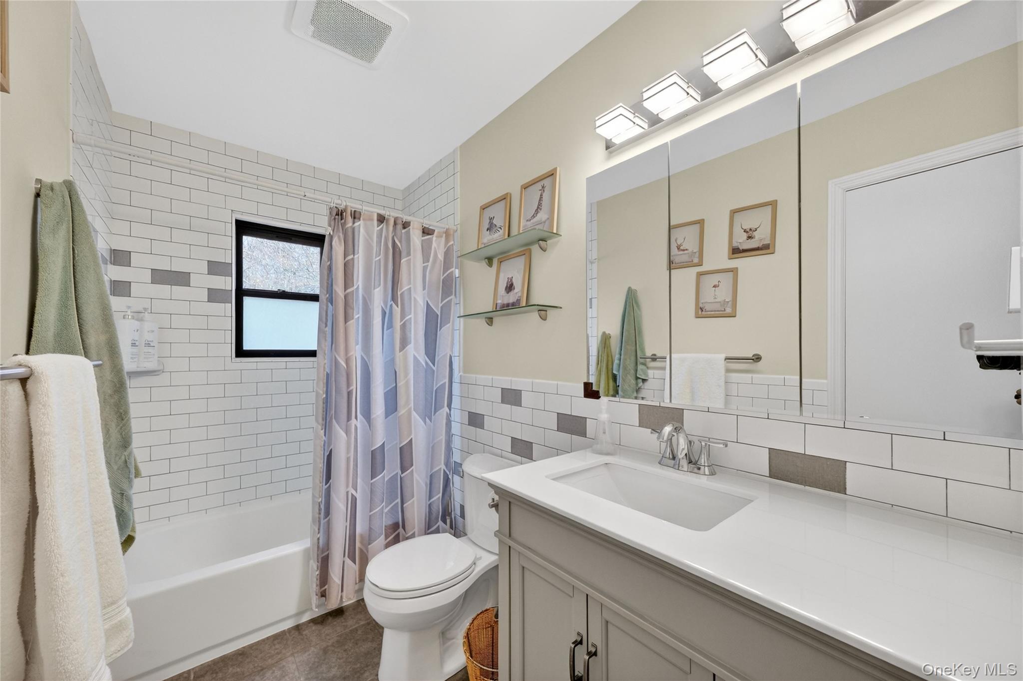 457 Forest Road Wallkill, NY 12589 - Photo 23 of 44 a bathroom with a sink toilet and shower