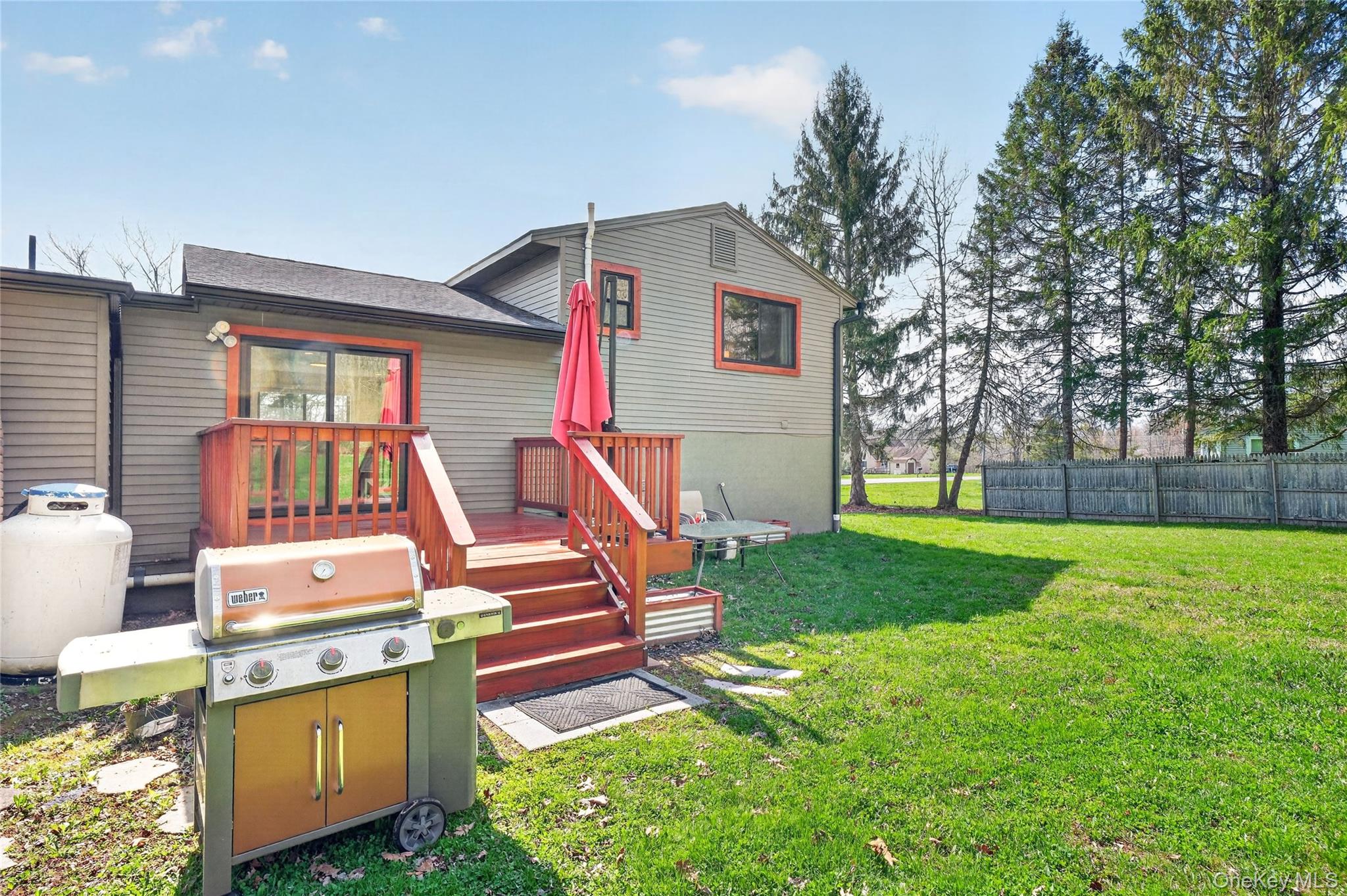 457 Forest Road Wallkill, NY 12589 - Photo 37 of 44 a front view of house with yard and outdoor seating