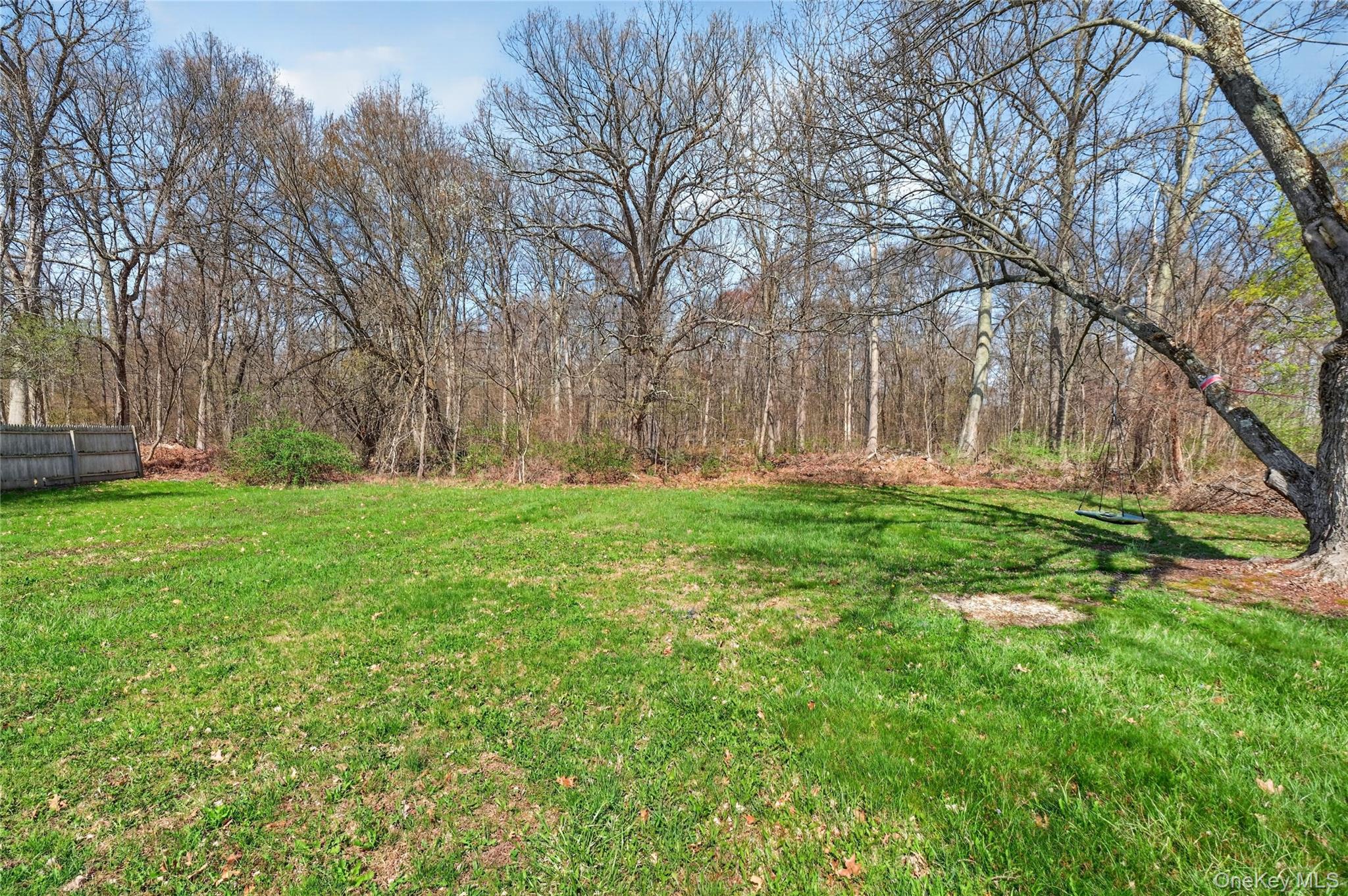 457 Forest Road Wallkill, NY 12589 - Photo 39 of 44 a backyard of a house with lots of green space