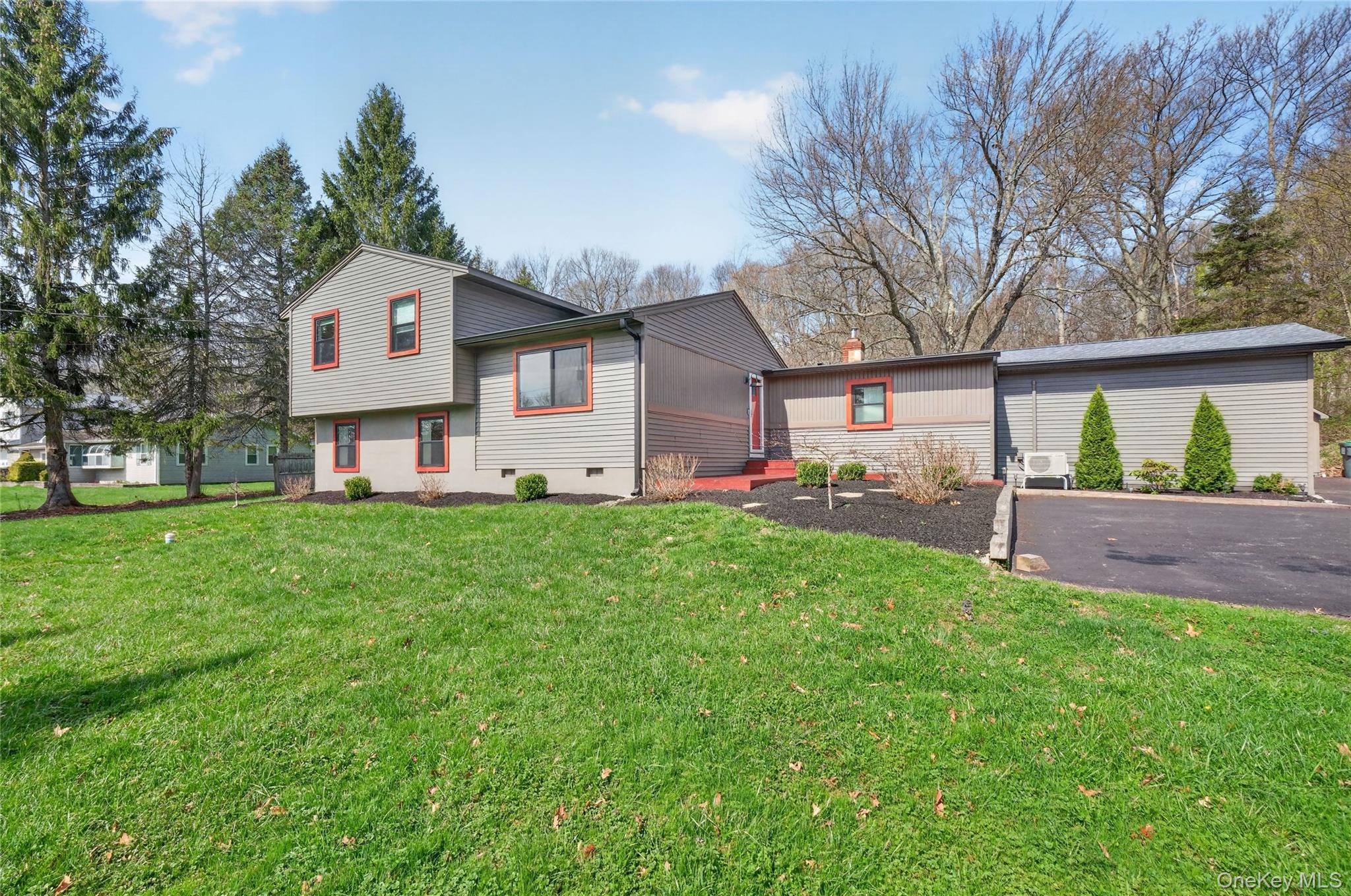 457 Forest Road Wallkill, NY 12589 - Photo 4 of 44 a front view of house with yard and green space