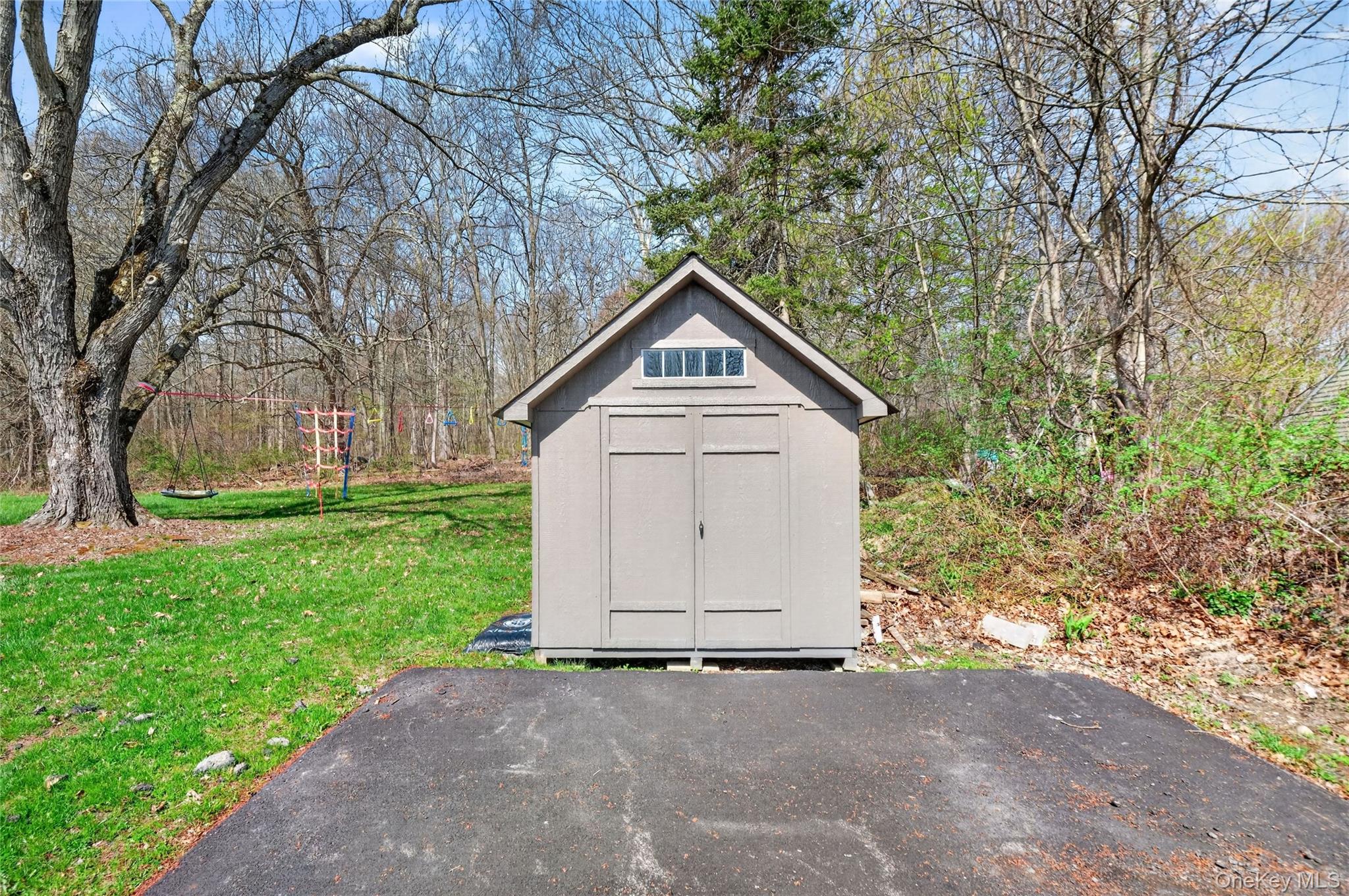 457 Forest Road Wallkill, NY 12589 - Photo 41 of 44 a front view of house with a garden