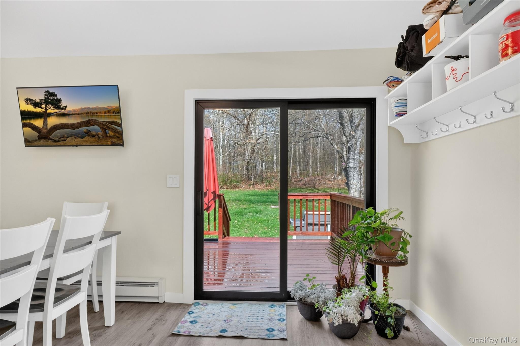 457 Forest Road Wallkill, NY 12589 - Photo 9 of 44 a room with table and chairs