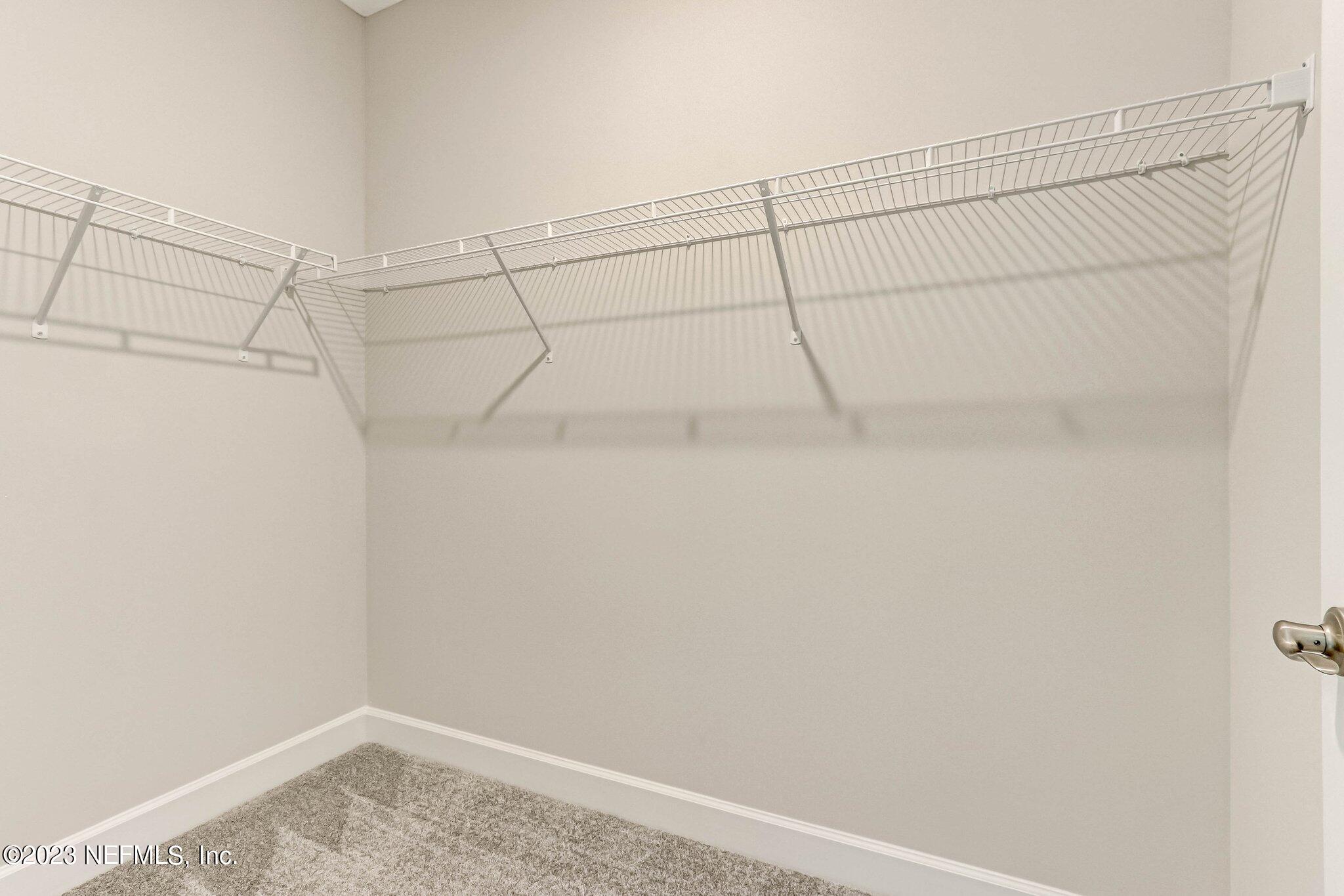 85156 Sandy Ridge Loop, Unit 18 Yulee, FL 32097 - Photo 19 of 25 a view of a rack on the wall