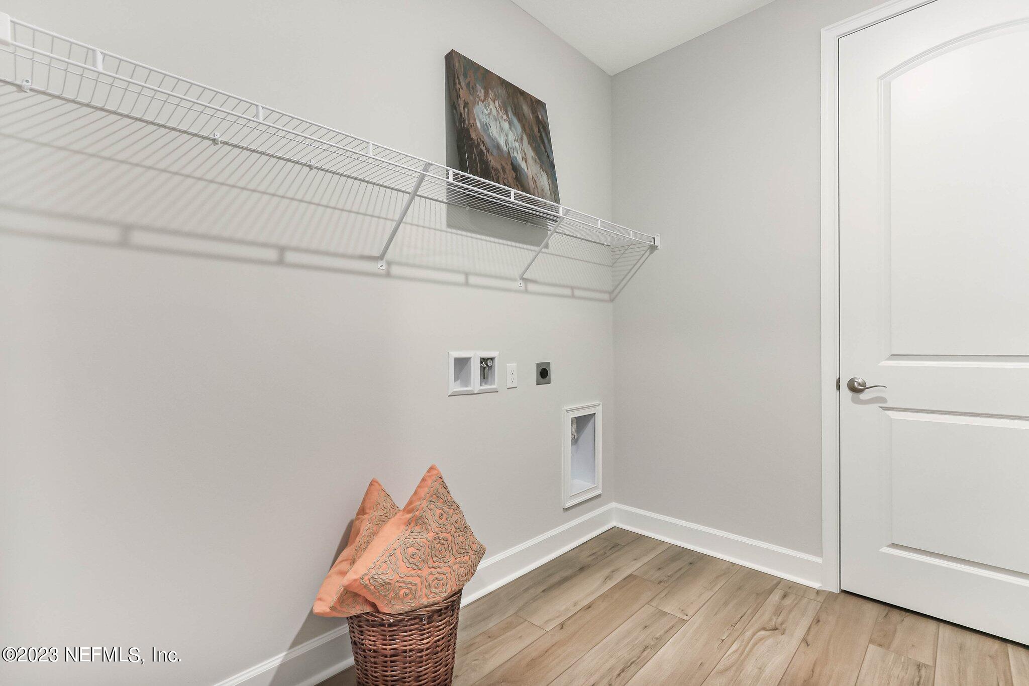 85156 Sandy Ridge Loop, Unit 18 Yulee, FL 32097 - Photo 23 of 25 a view of a hallway with closet