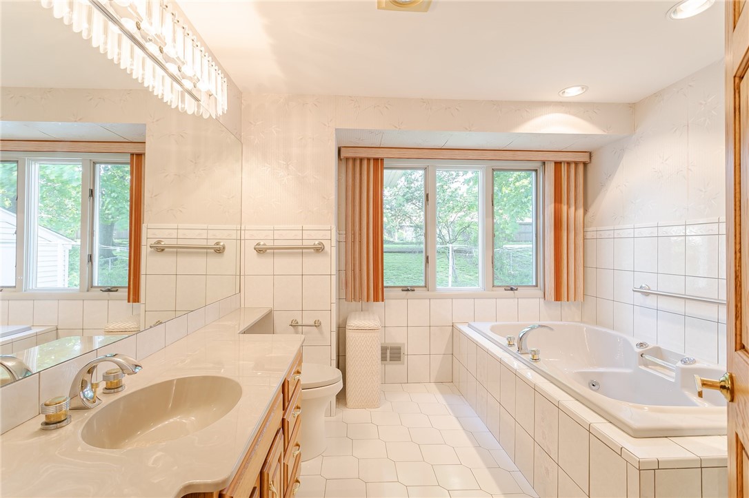 129 Fox Hall Drive Irondequoit, NY 14609 - Photo 10 of 24 main bath...there is a stand up shower behind the