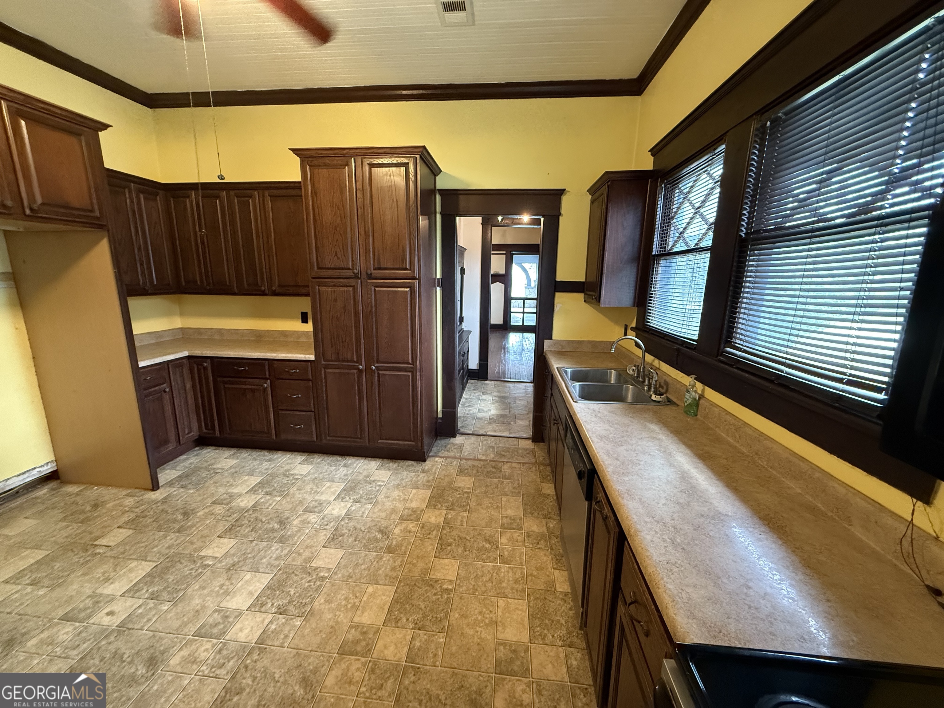 55 Hatcher Street Kite, GA 31049 - Photo 15 of 32 a view of a kitchen with wooden floor and furniture