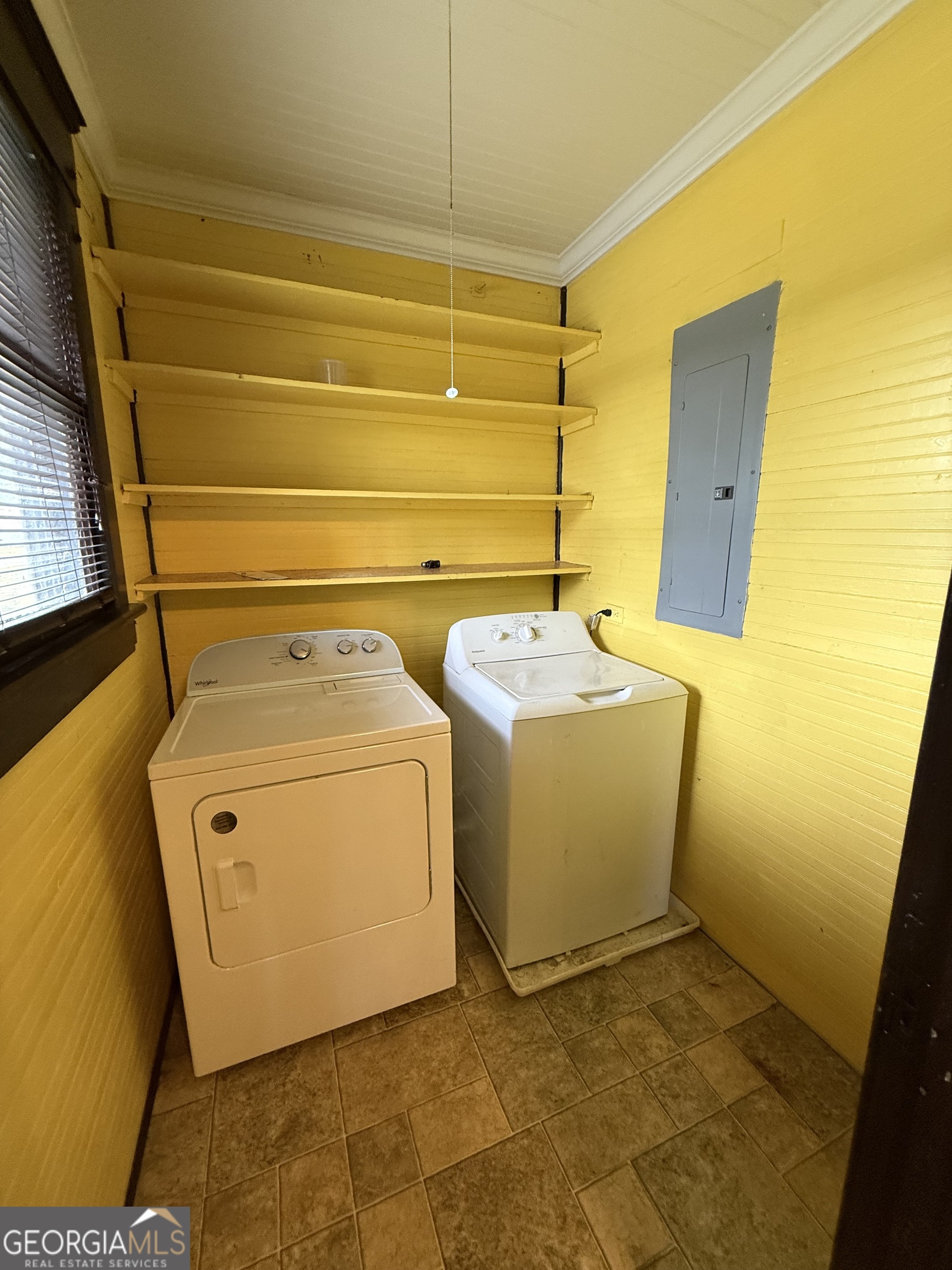 55 Hatcher Street Kite, GA 31049 - Photo 17 of 32 a utility room with dryer and washer