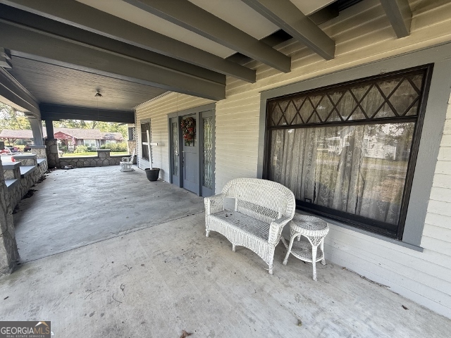 55 Hatcher Street Kite, GA 31049 - Photo 19 of 32 a living room with furniture and a window