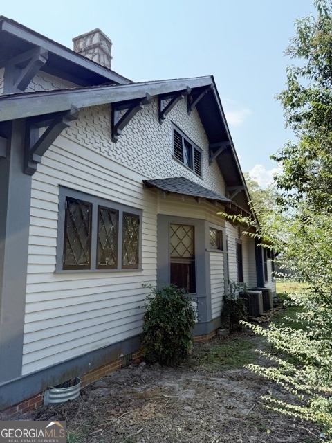 55 Hatcher Street Kite, GA 31049 - Photo 20 of 32 a front view of a house with garden