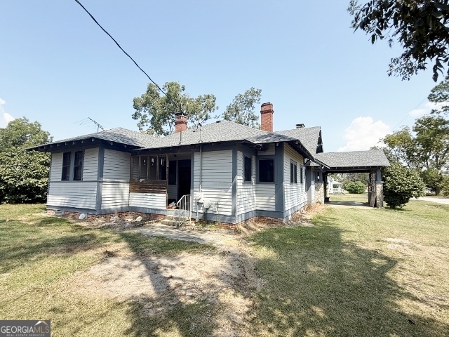 55 Hatcher Street Kite, GA 31049 - Photo 24 of 32 a front view of a house with a yard