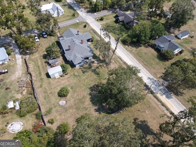 55 Hatcher Street Kite, GA 31049 - Photo 29 of 32 an aerial view of residential houses with outdoor space