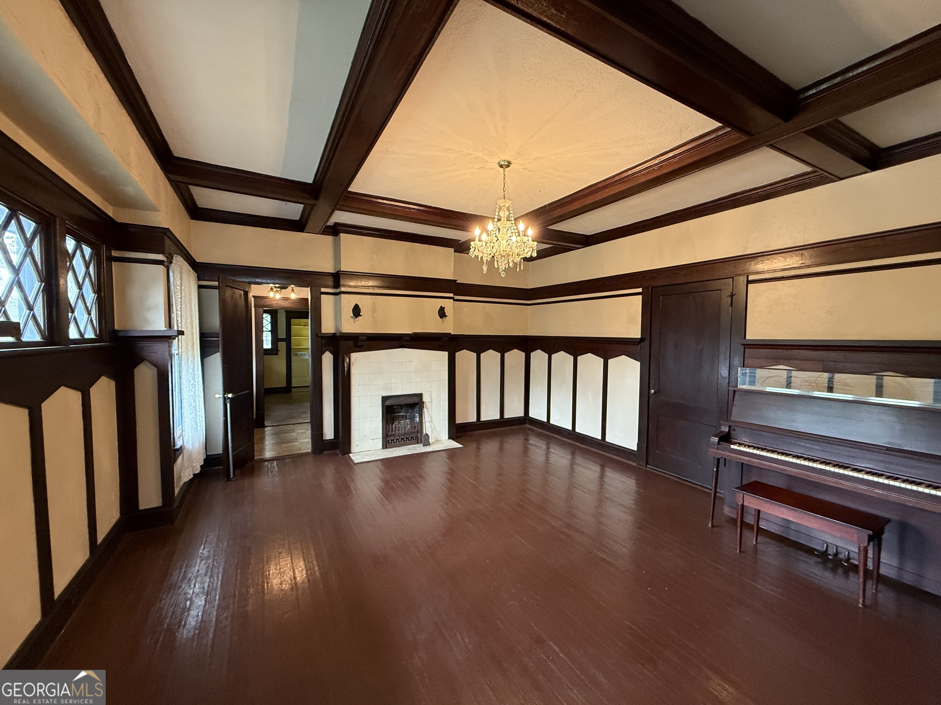 55 Hatcher Street Kite, GA 31049 - Photo 3 of 32 a view of a hallway with wooden floor