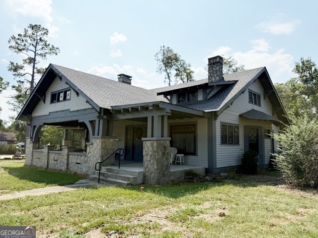 55 Hatcher Street Kite, GA 31049 - Photo 32 of 32 a front view of a house with garden