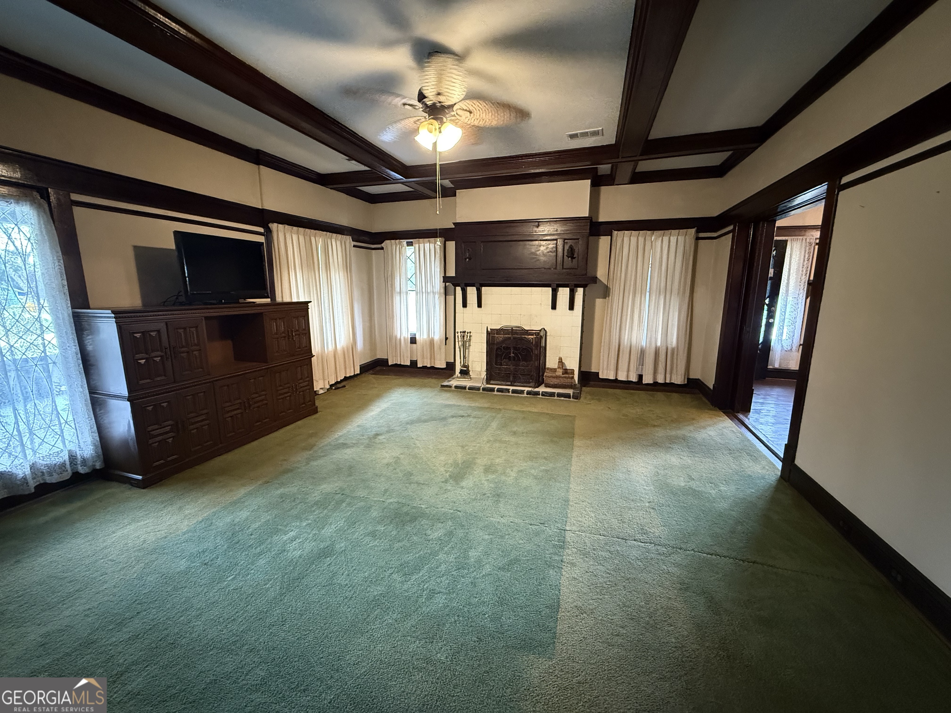 55 Hatcher Street Kite, GA 31049 - Photo 5 of 32 a view of a livingroom with a fireplace