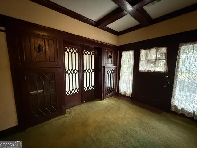 an empty room with windows