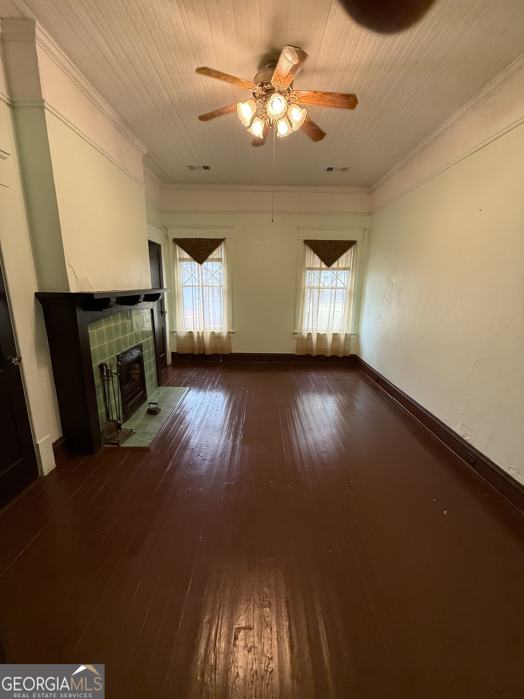 55 Hatcher Street Kite, GA 31049 - Photo 7 of 32 a view of a livingroom with a fireplace and window