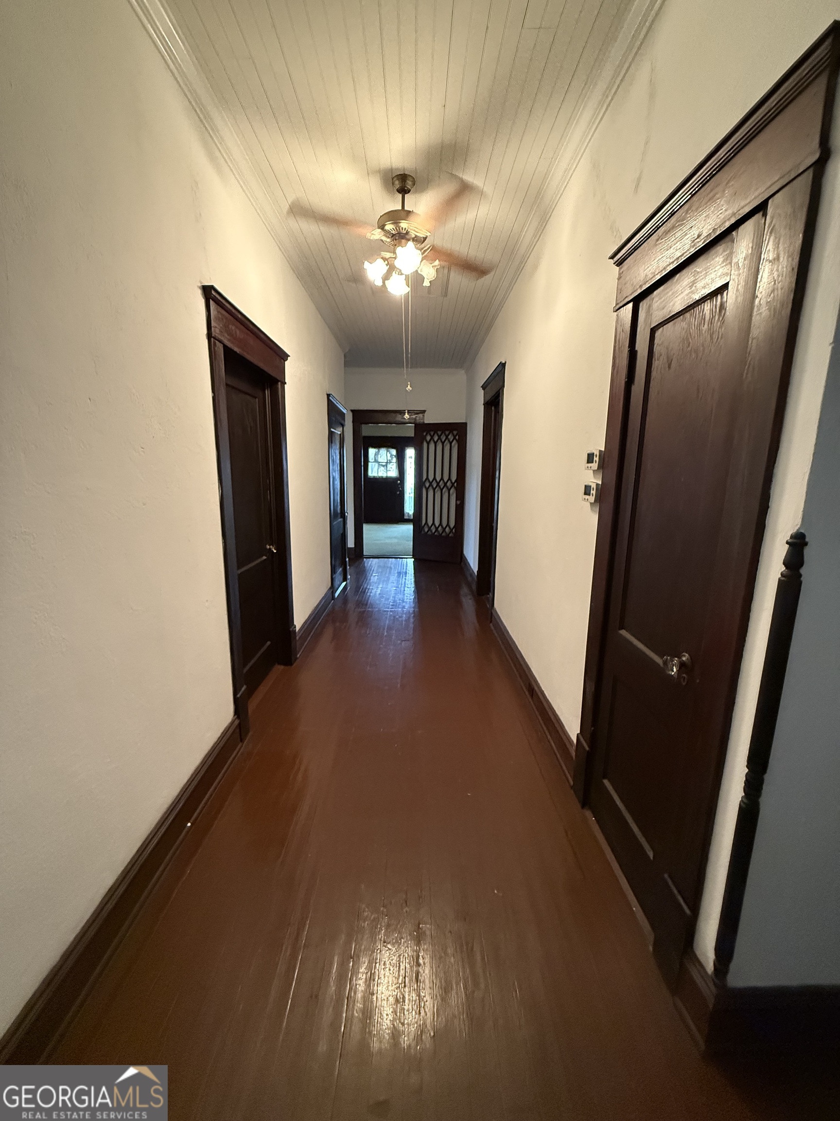 55 Hatcher Street Kite, GA 31049 - Photo 10 of 32 a view of a hallway with windows
