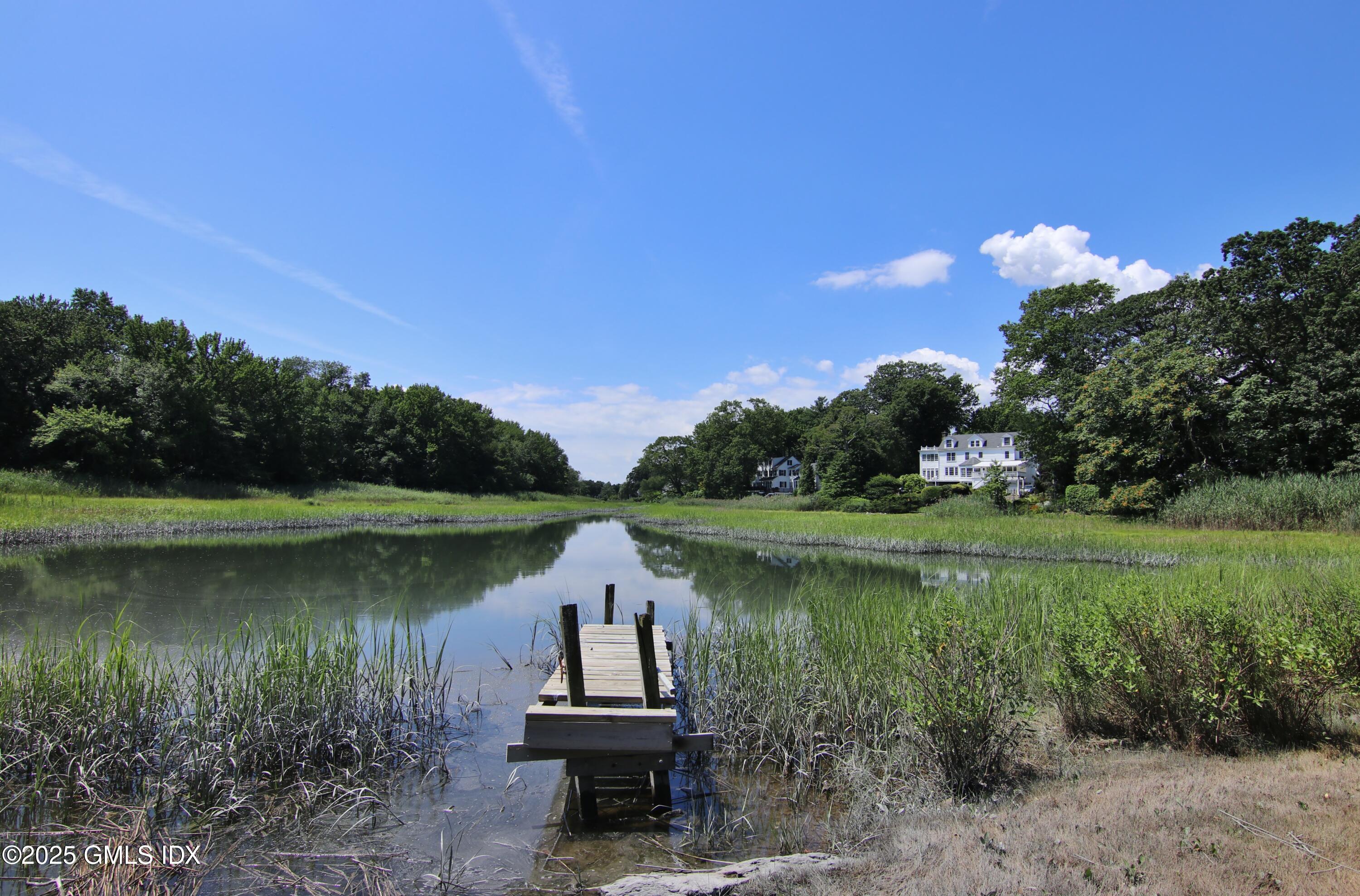 420 Davis Avenue Greenwich, CT 06830 - Photo 2 of 35 a lake view with a lake view