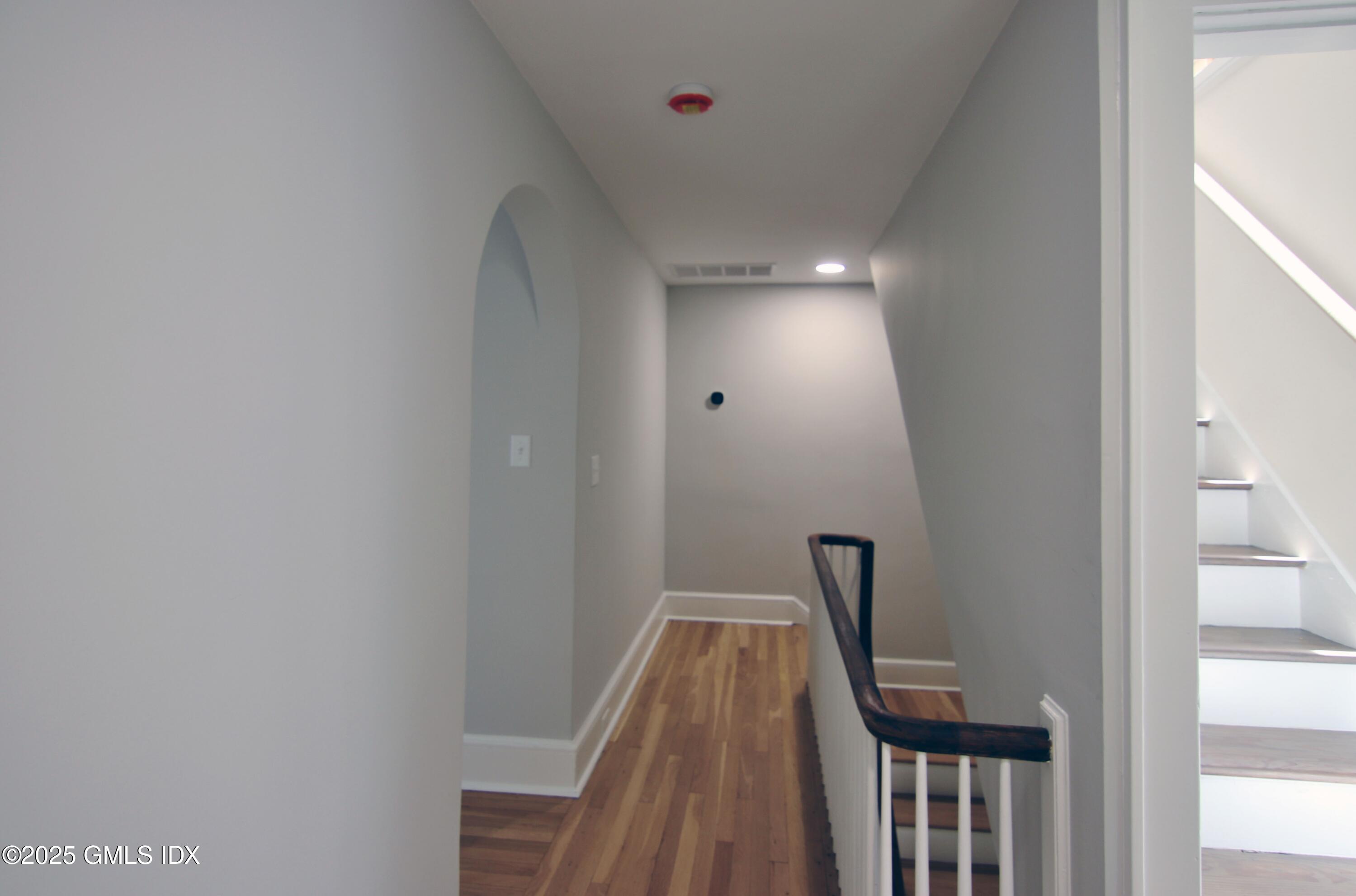 420 Davis Avenue Greenwich, CT 06830 - Photo 28 of 35 a view of a hallway with staircase