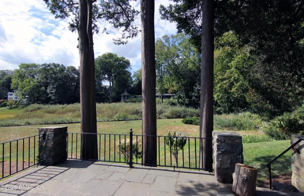 a view of a patio with backyard