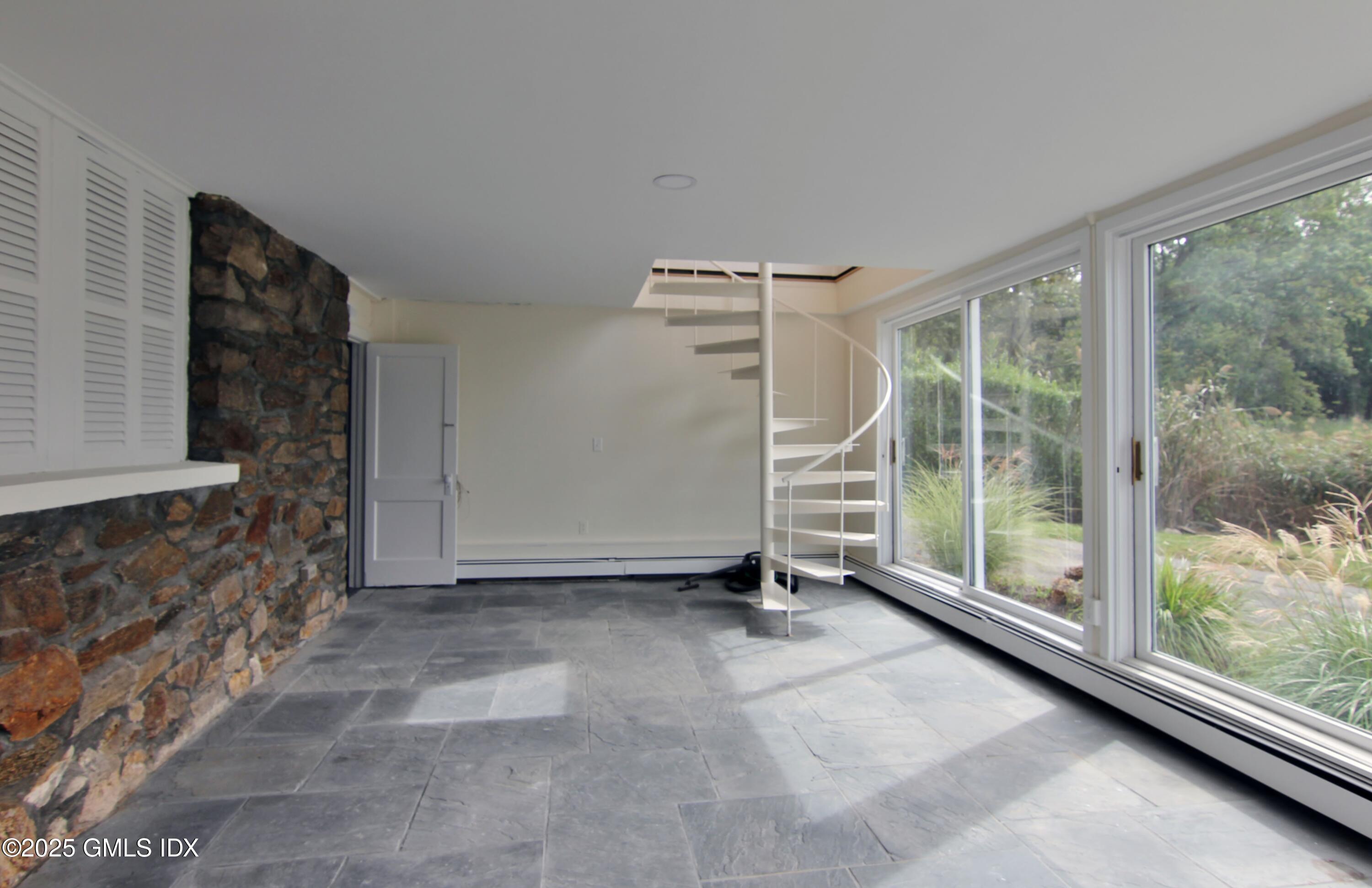 420 Davis Avenue Greenwich, CT 06830 - Photo 34 of 35 a view of an empty room and window