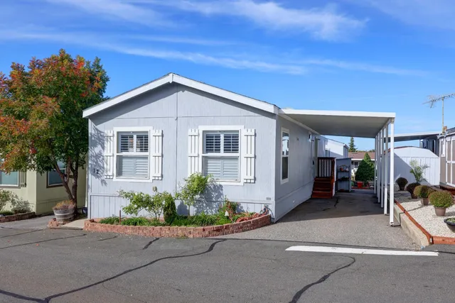a view of a house with entertaining space