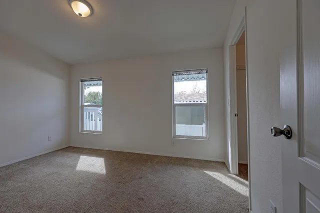 an empty room that has a window