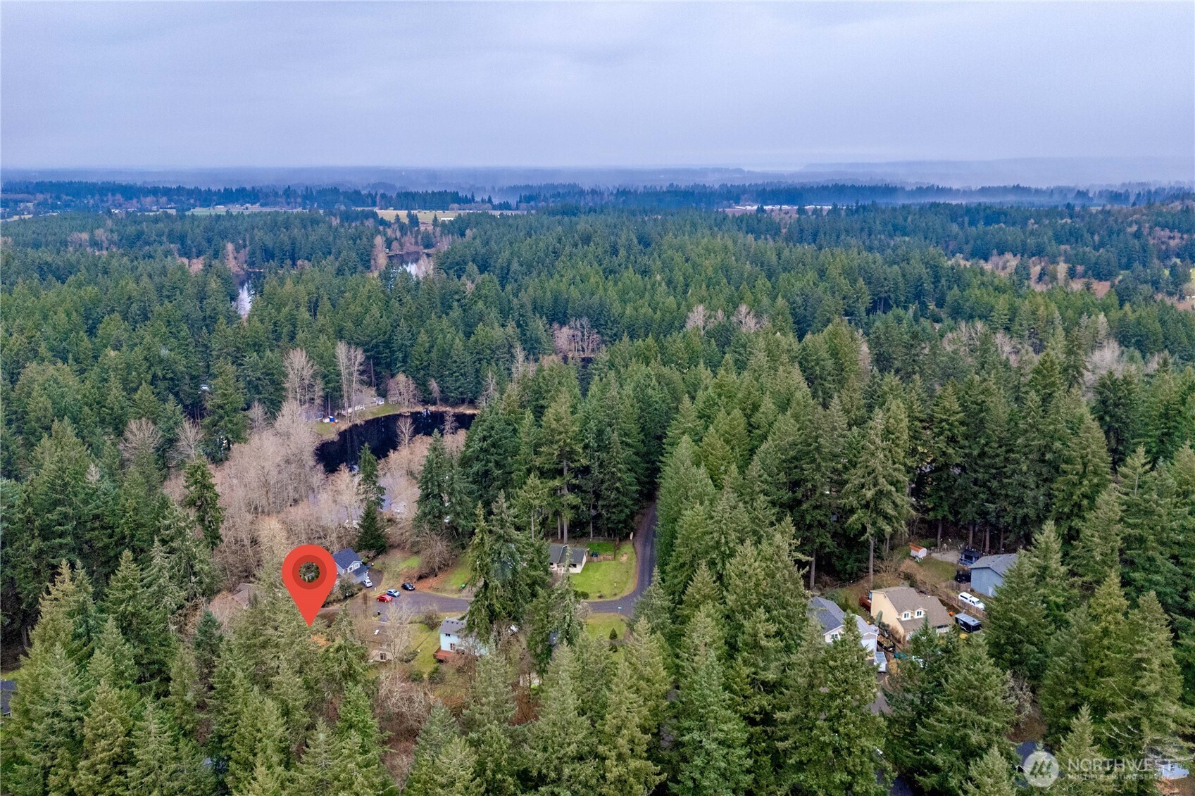 7923 Incline Court Southeast Olympia, WA 98513 - Photo 4 of 19 an aerial view of a town with trees and houses
